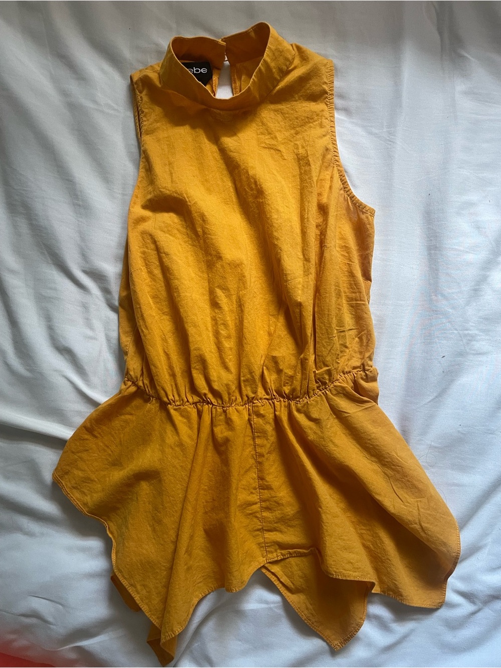 bebe Yellow Sleeveless Peplum Top